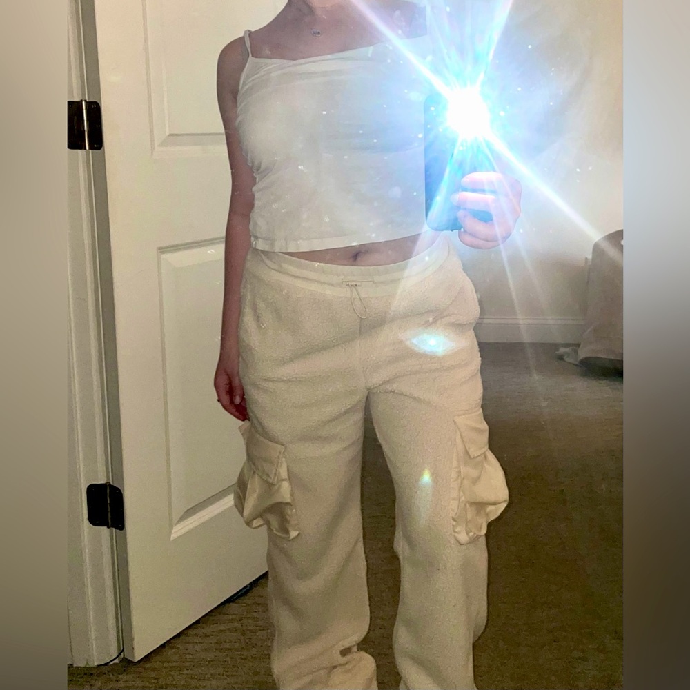 beige straight-legged fluffy pants with pockets